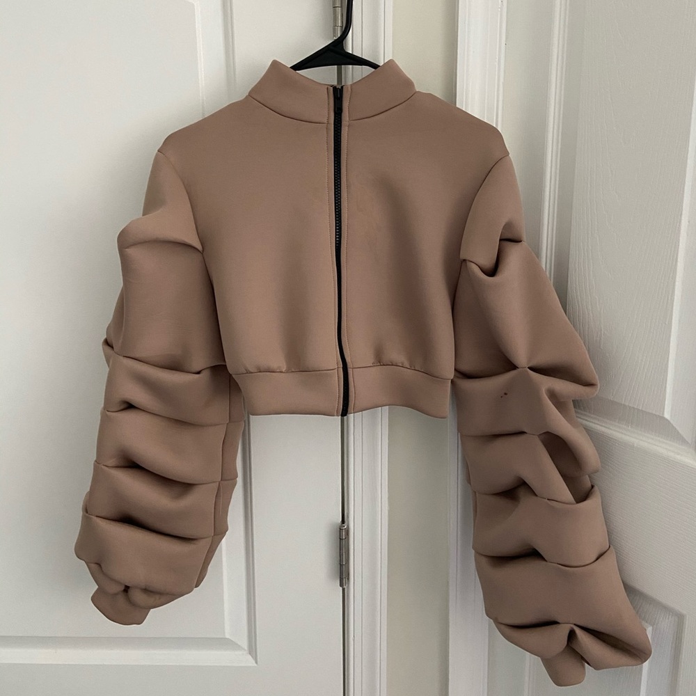 Puffy cropped jacket.